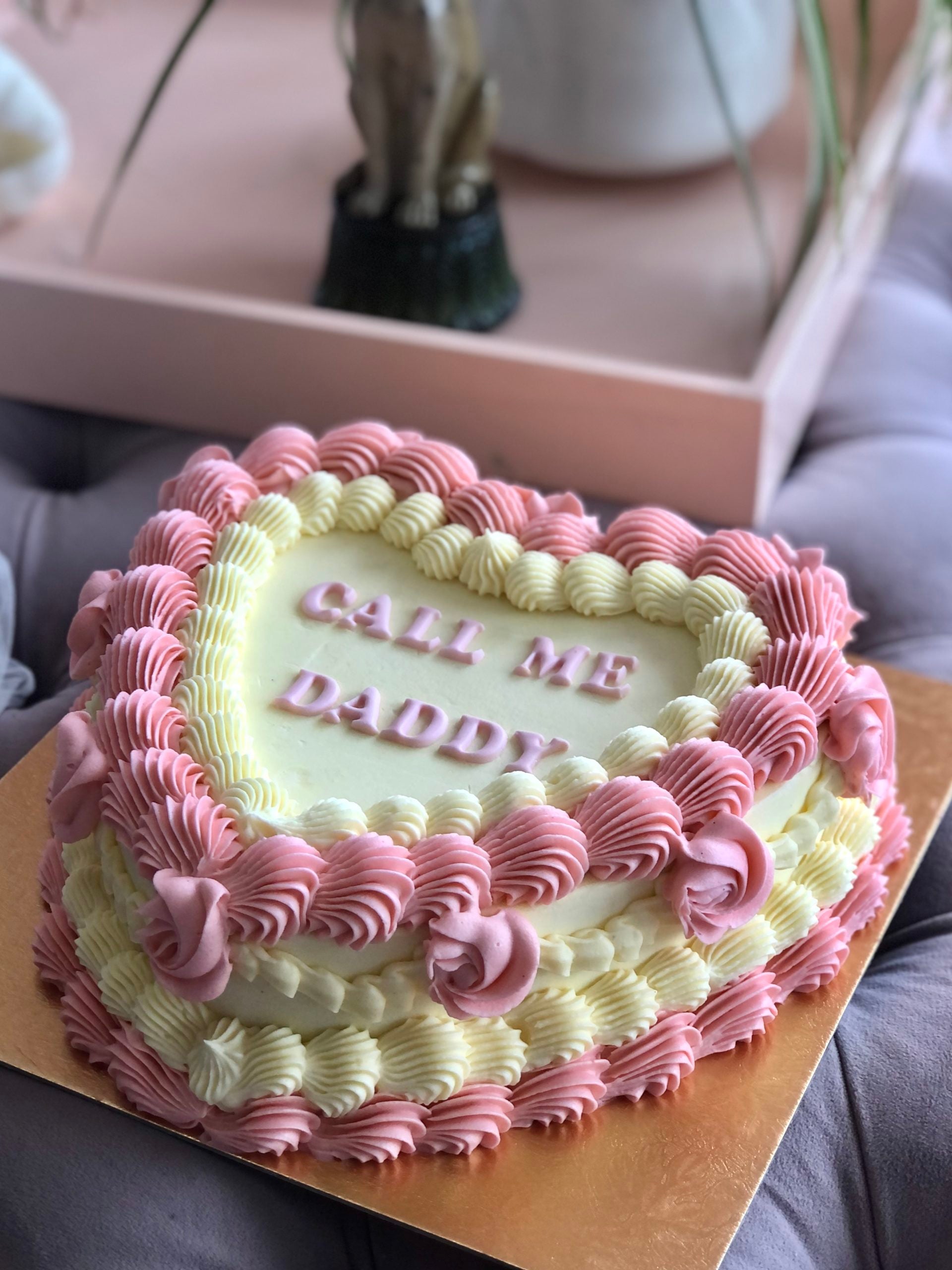 Heart cake with call me daddy written on it