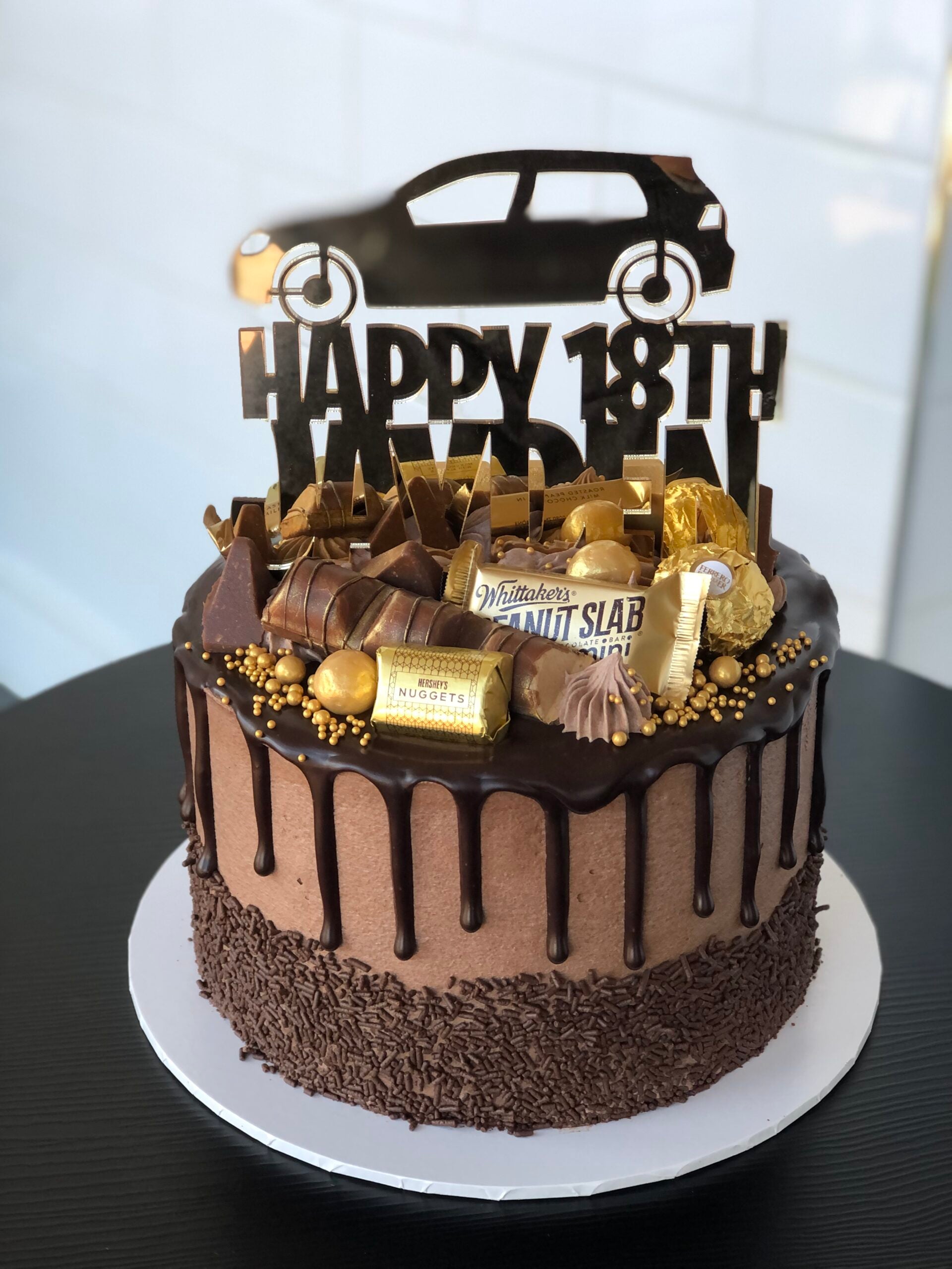 18th chocolate birthday cake with a car on top