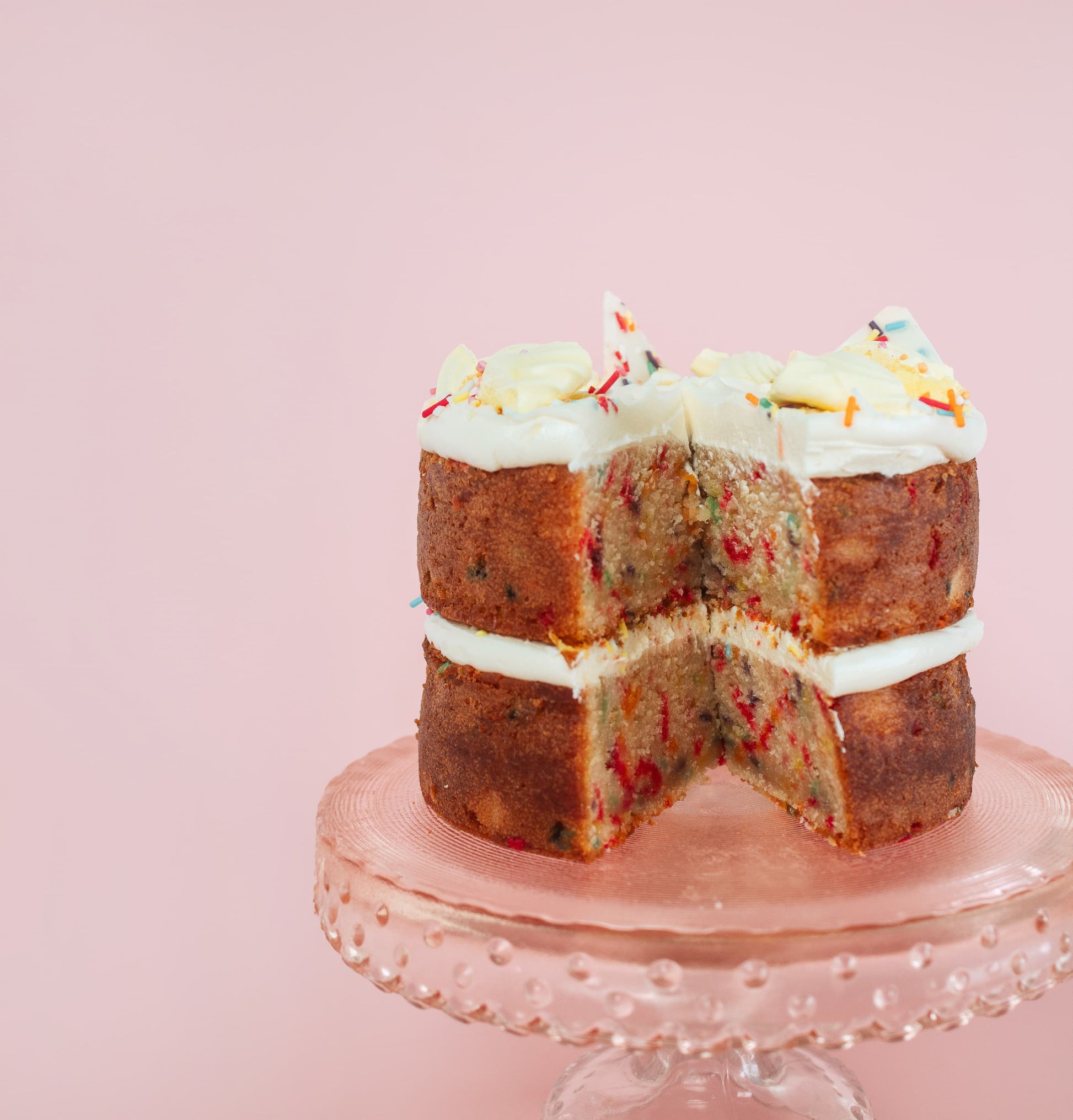 vanilla confetti sprinkle cake cut open